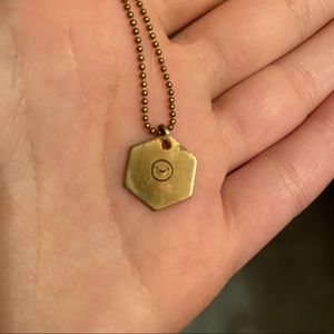 Small smiley face necklace